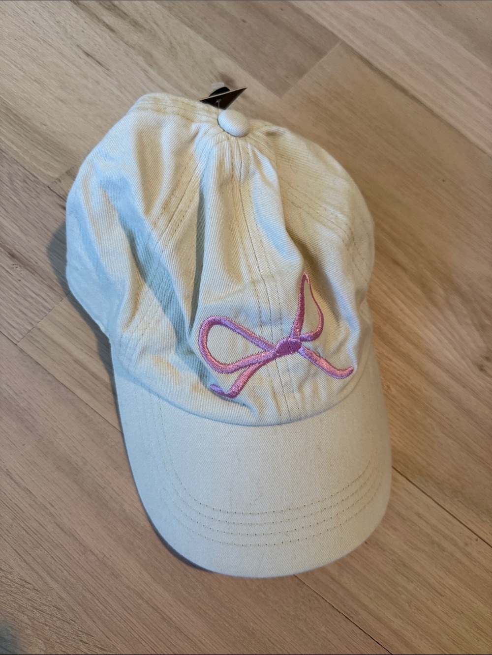 David and Young Cream Cap with Pink Bow Embroidery